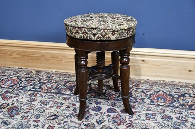 Lot 142 - A 19th century mahogany adjusting piano stool,...