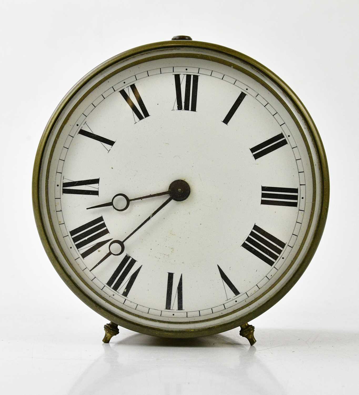 Lot 6423 - A brass cased ship's clock, with white enamel...