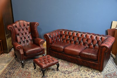 Lot 184 - A modern Chesterfield red leather three seater...