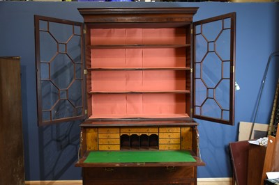 Lot 1 - An early 19th century inlaid mahogany...