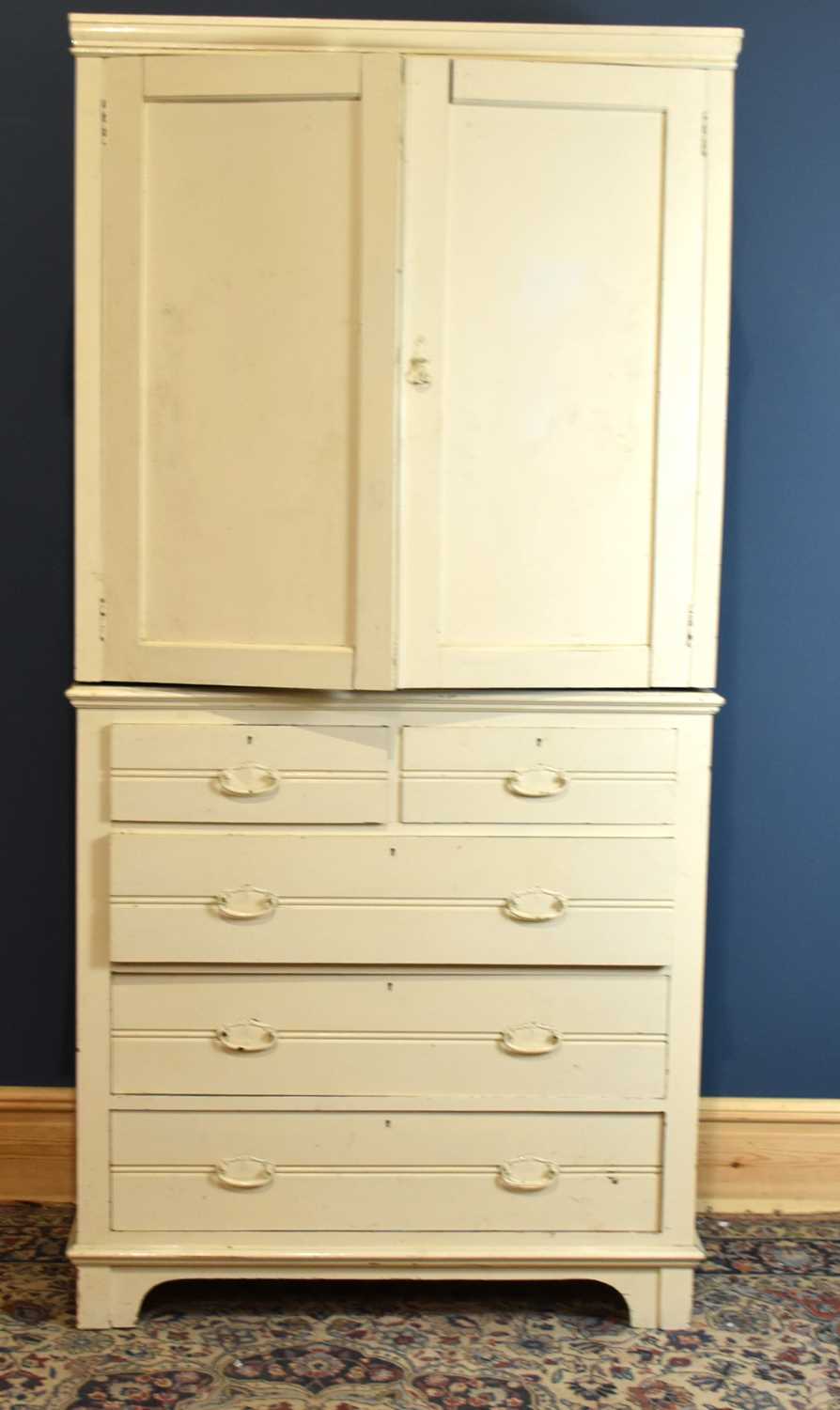 Lot 6630 - A white painted tallboy with pair of panelled...