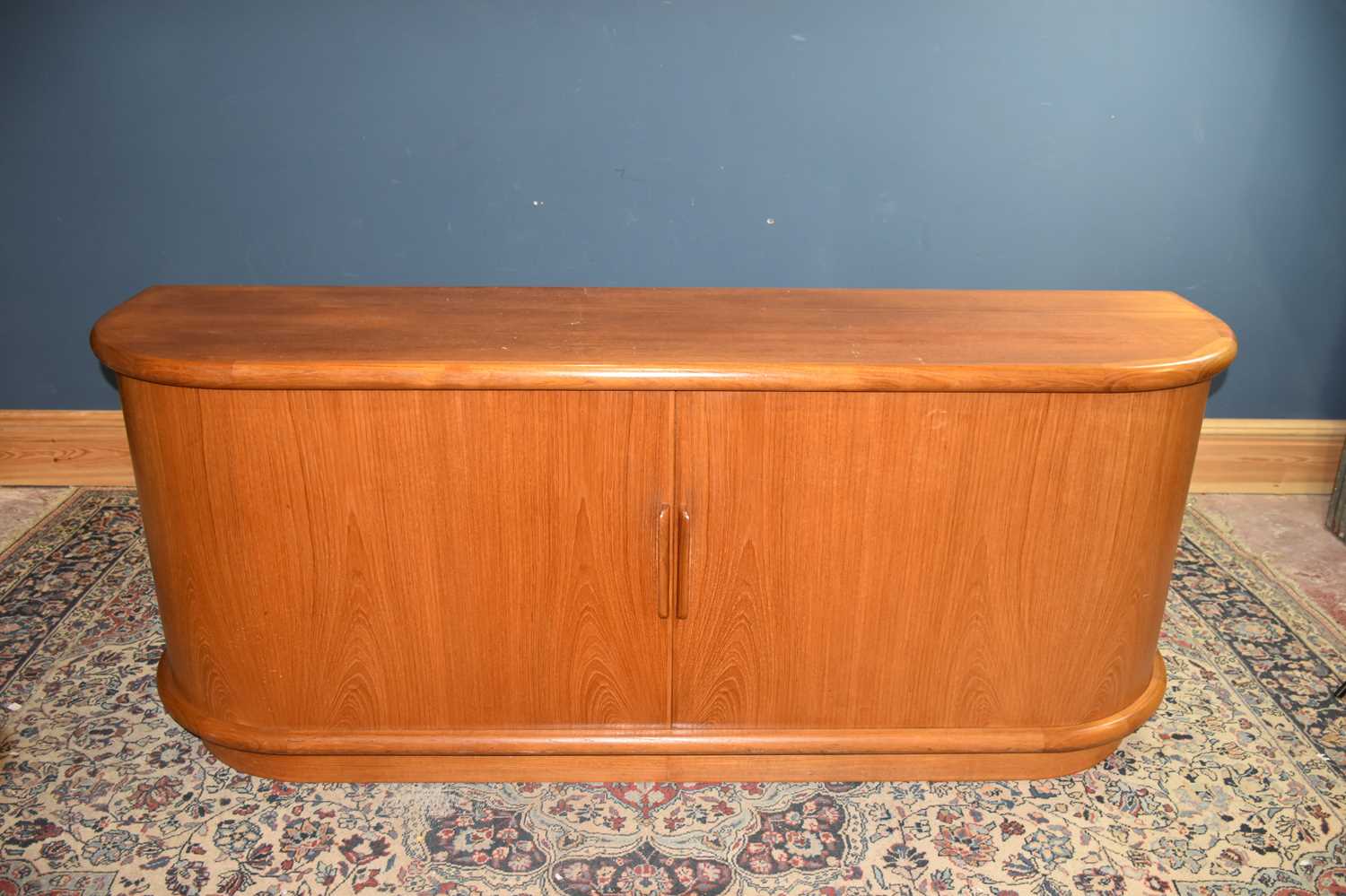 Lot 6708 - A Danish teak sideboard with tambour front...