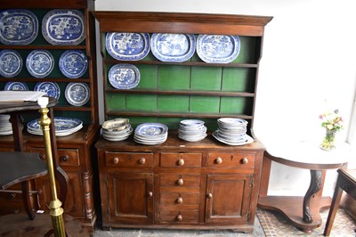 Lot 1201 - An 18th century stained pine dresser, the...