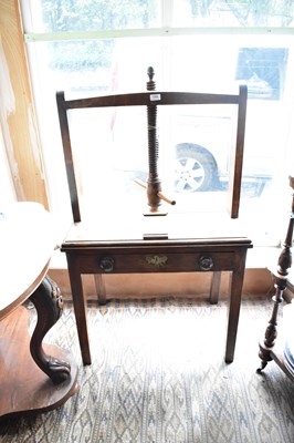 Lot 1203 - An 18th century oak press table with single...