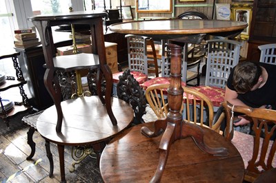 Lot 1208 - An 18th century mahogany tilt-top tripod table...