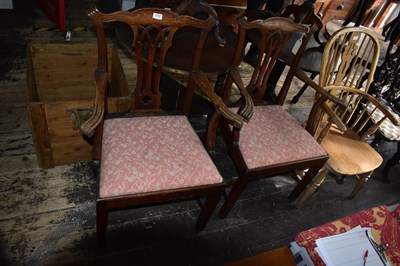 Lot 1214 - Two George III oak elbow chairs with drop-in...