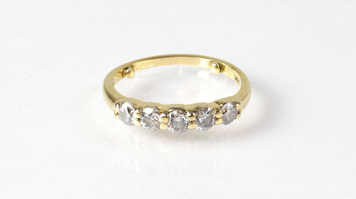Lot 852 - A 14ct gold diamond five-stone ring, total