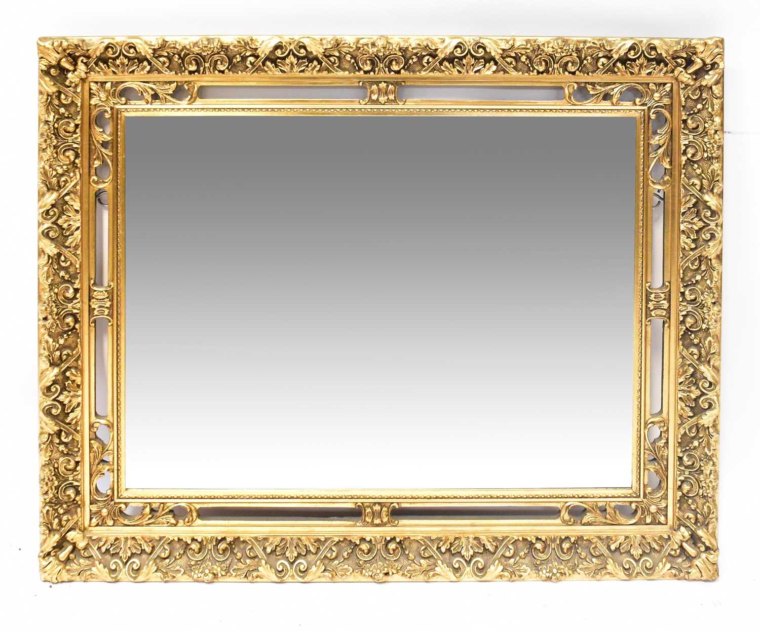 Lot 88 - A gilt framed rectangular wall mirror with...