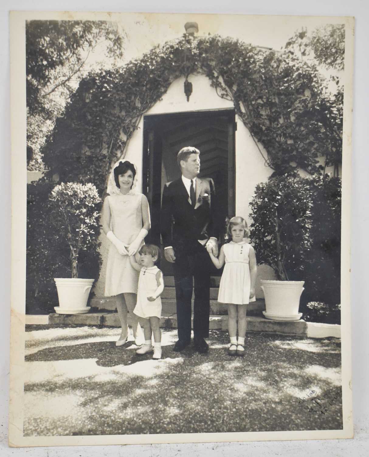 Lot 400 - A black and white photograph of John F Kennedy...