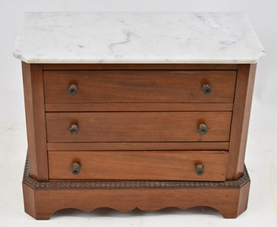 Lot 387 - A mahogany miniature chest with white marble...