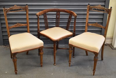 Lot 95 - A pair of Edwardian walnut and ebonised Gothic...