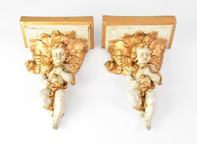 Lot 143 - A pair of plaster wall brackets in the form of...