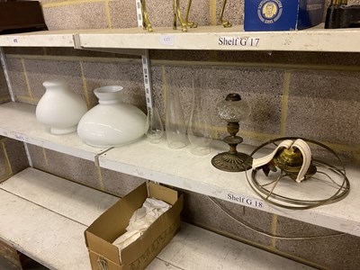 Lot 141 - A quantity of oil lamp parts, to include three...