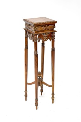 Lot 49 - A 20th century mahogany jardinière stand