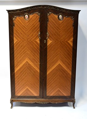 Lot 53 - A French mahogany reproduction gilt-heightened...