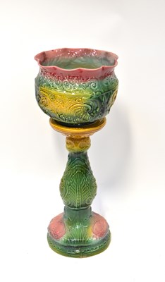 Lot 491 - A Majolica-style planter on stand, height 78cm.