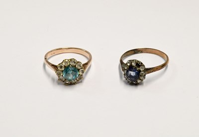 Lot 1082 - A yellow metal, topaz and white stone cluster ring