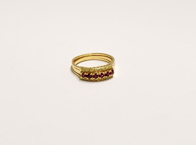 Lot 1081 - A yellow metal ring
