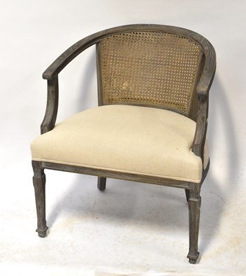 Lot 69 - An early 20th century bowed bergère open...