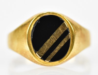 Lot 227 - An 18ct yellow gold Art Deco designed signet...