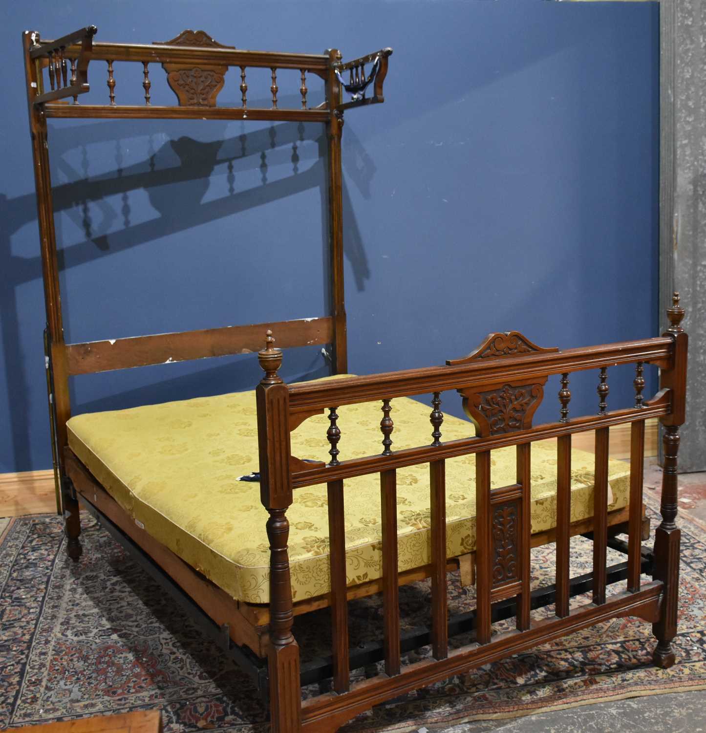 Lot 36 - An Edwardian double bedstead, with carved...