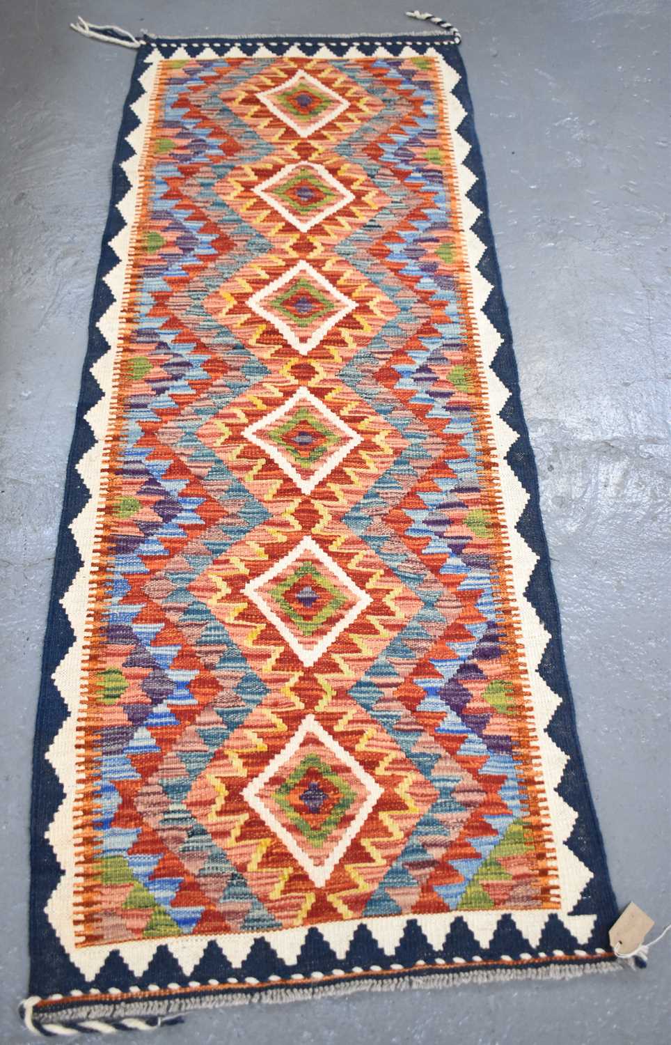 Lot 121 - A handmade Chobi Kilim runner, 190 x 70cm.