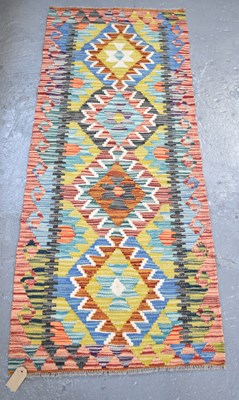 Lot 106 - A handmade woollen Chobi Kilim runner, 150 x...