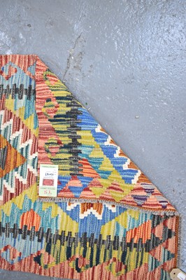 Lot 106 - A handmade woollen Chobi Kilim runner, 150 x...