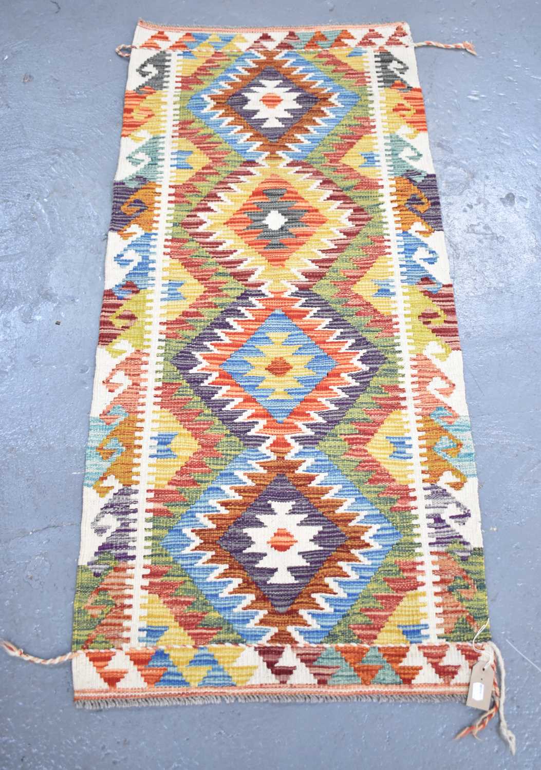 Lot 128 - A handmade woollen Chobi Kilim runner, 153 x...