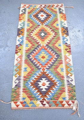 Lot 107 - A handmade woollen Chobi Kilim runner, 153 x...