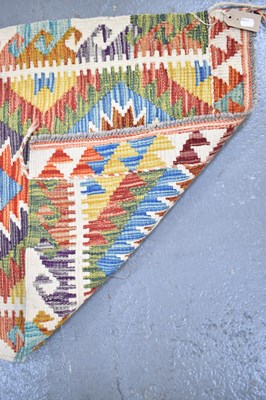 Lot 128 - A handmade woollen Chobi Kilim runner, 153 x...