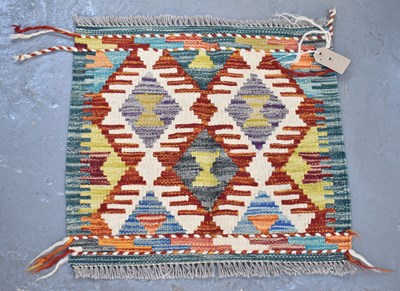 Lot 111 - A small handmade woollen Chobi Kilim, 48 x 52cm.