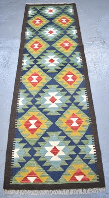 Lot 108 - A handmade woollen Maimana Kilim runner, 201 x...