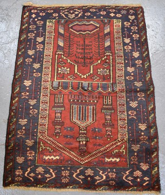 Lot 109 - A handmade woollen Baluchi rug, 108 x 77cm.