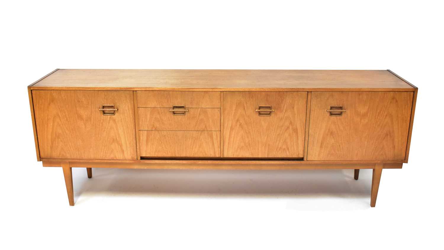 Lot 16 - A mid-20th century teak sideboard with...