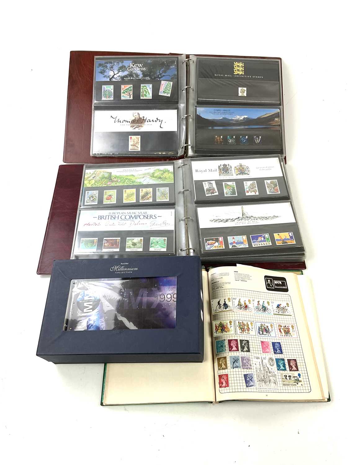 Lot 6032 - Two albums of Royal Mint First Day Covers,...