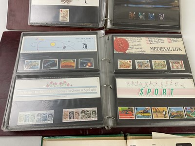 Lot 6032 - Two albums of Royal Mint First Day Covers,...