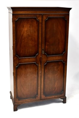 Lot 55 - A mid-20th century mahogany wardrobe