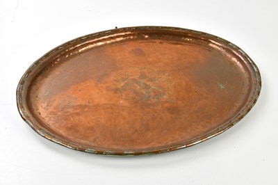 Lot 291 - HUGH WALLIS; a large copper tray centrally...