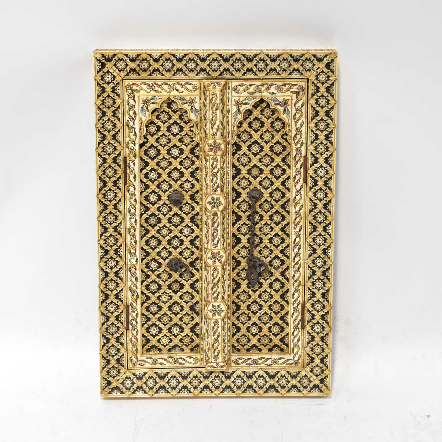 Lot 91 - A late 19th/early 20th century ornate Indian...