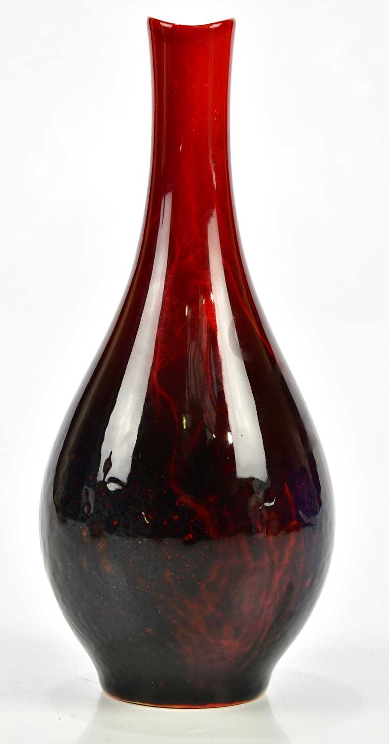 Lot 61 - ROYAL DOULTON; a veined flambe baluster shaped...
