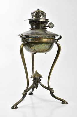 Lot 282 - An Arts and Crafts silver plated table lamp in...