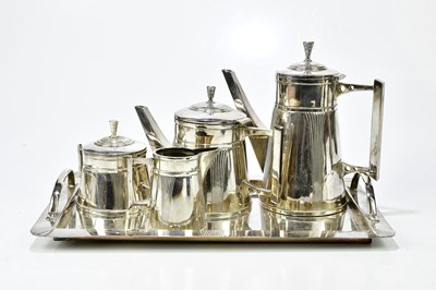 Lot 299 - An Arts and Crafts style silver plated tea...