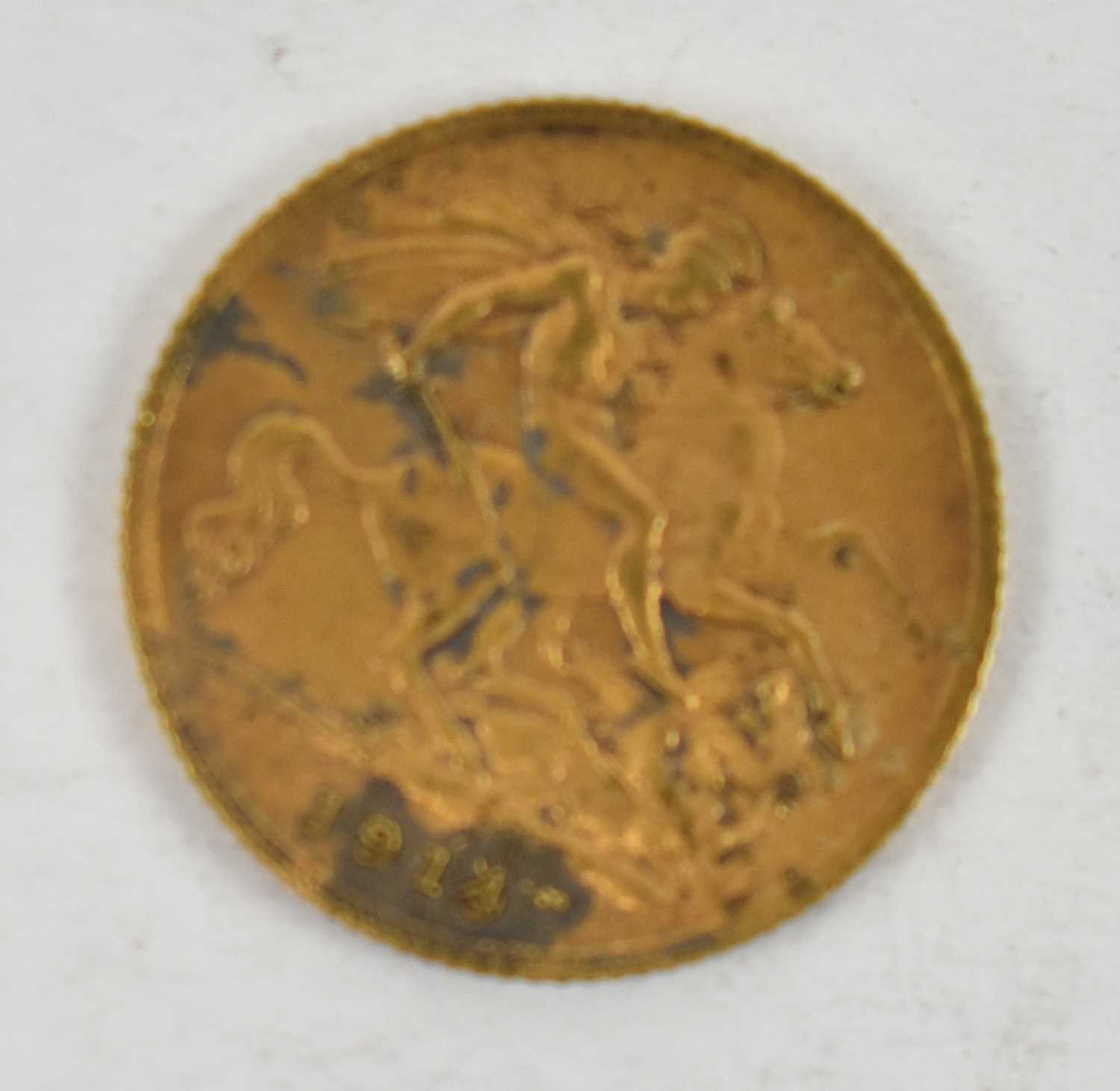 Lot 871 - A George V 1914 half sovereign.