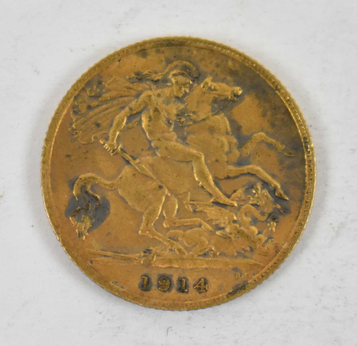 Lot 882 - A George V 1914 half sovereign.