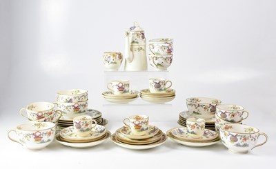 Lot 259 - ROYAL WORCESTER; an Oriental-style floral tea...