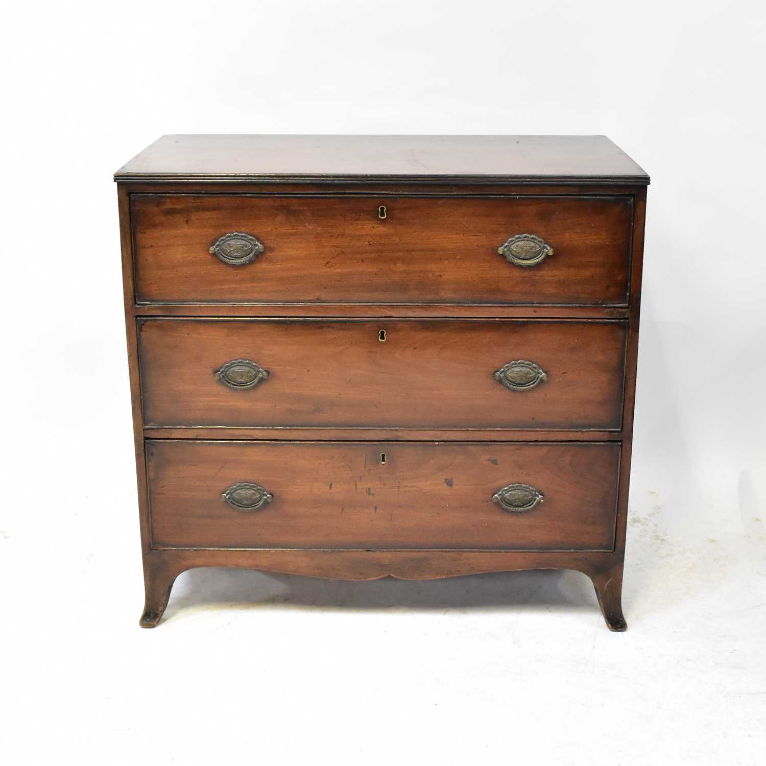 Lot 5 - An Edwardian mahogany chest of three long...