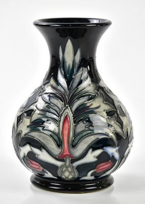 Lot 120 - MOORCROFT; a baluster vase in the 'Snake's...