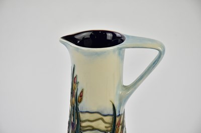 Lot 128 - MOORCROFT; a ewer decorated in the 'Islay'...