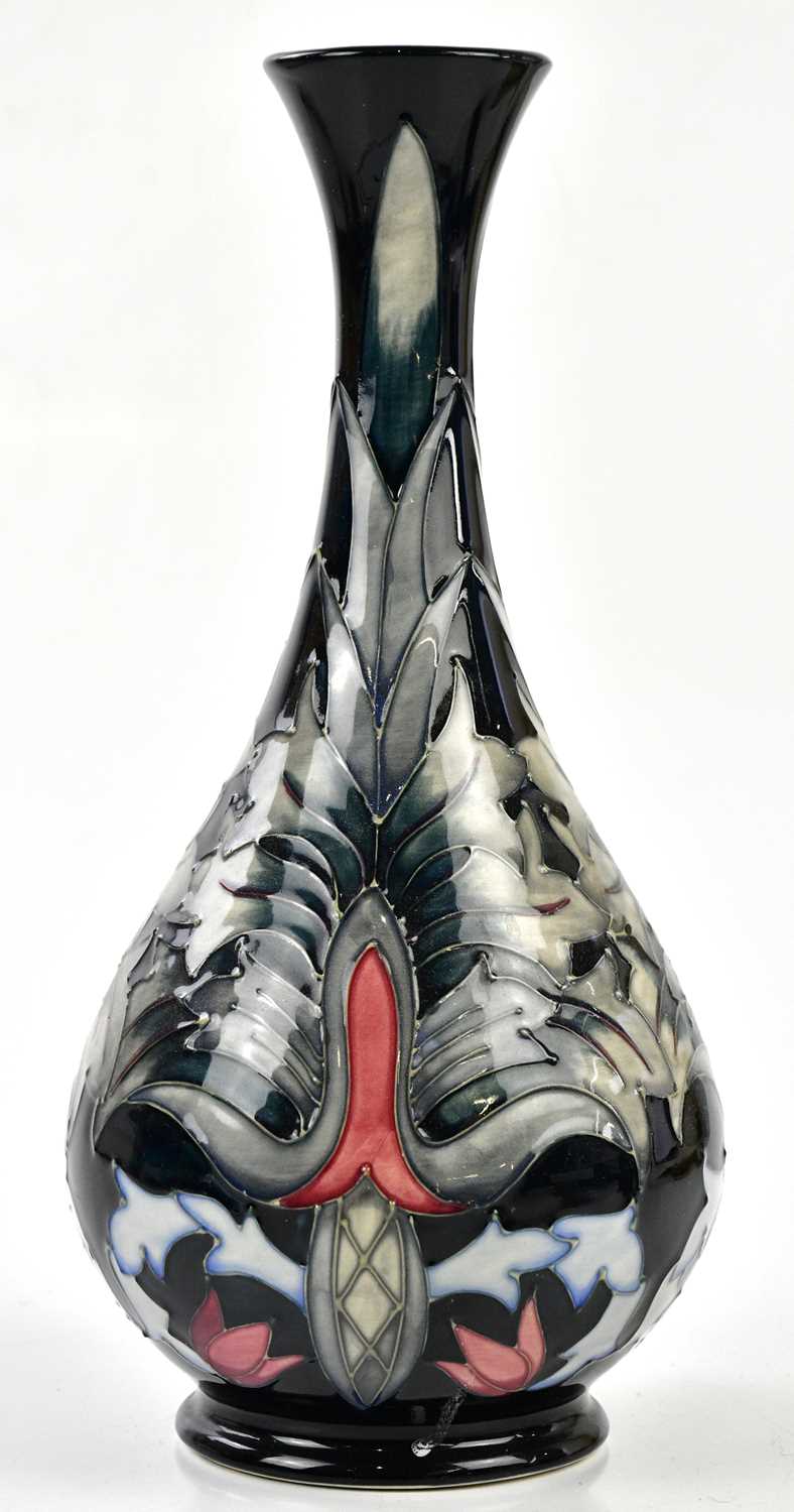 Lot 95 - MOORCROFT; a large baluster shaped vase,...
